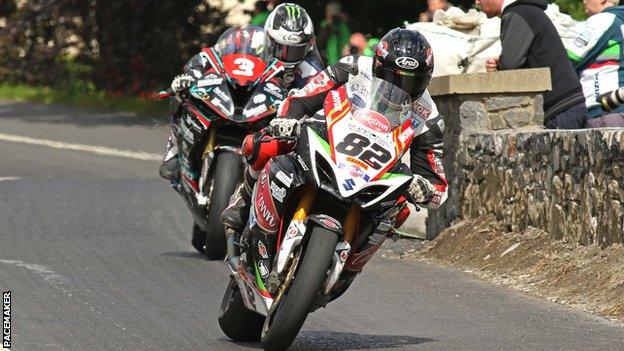 Derek Sheils leads Michael Dunlop during the Open Superbike race at Skerries in July 2016