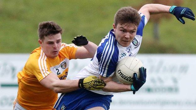 Antrim's Conor Hamill attempts to keep pace with Monaghan's Barry McGinn