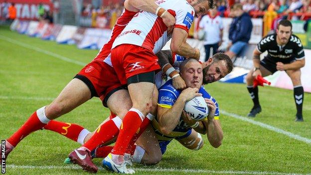 Warrington Wolves' Tom Lineham scores his side's third try during their Challenge Cup quarter-final tie against Hull Kingston Rovers