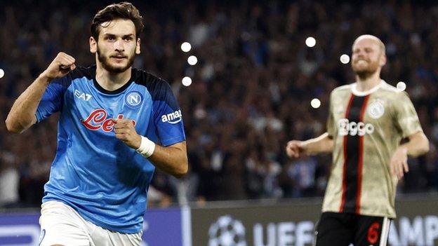 Khvicha Kvaratskhelia of SSC Napoli celebrates scoring against Ajax in the Champions League