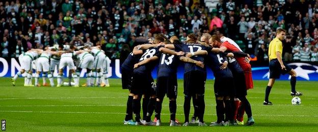 Celtic and Malmo go into their huddles before kick-off