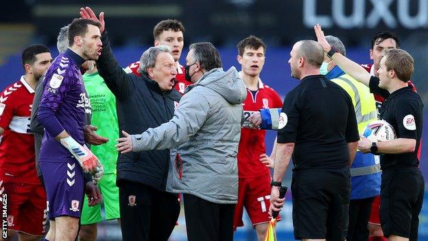 Neil Warnock leads Middlesbrough's protests after Swansea's contentious late penalty