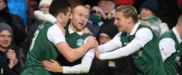 Hibs' John McGinn, Dylan McGeouch and Jason Cummings celebrate