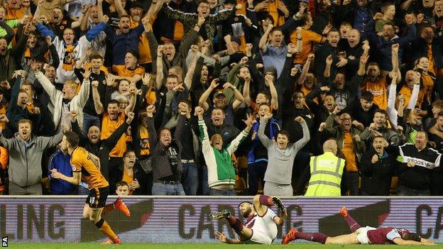 Wolves fans celebrate their opening goal against Aston Villa