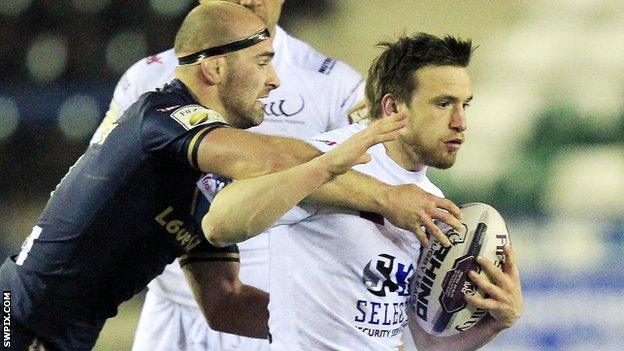 Widnes's Joe Mellor tries to get away from a tackle