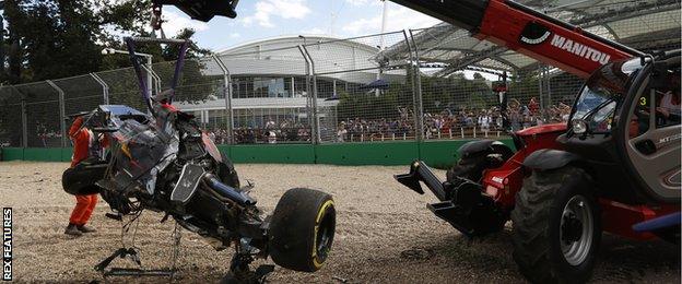 Alonso's car on the crane