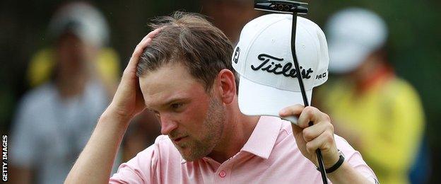 Bernd Wiesberger waves to the crowd at the end of his round