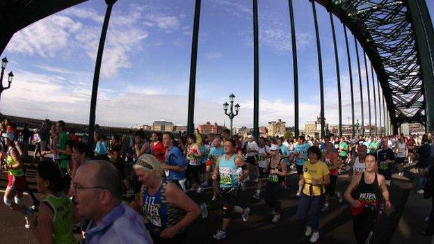 Runners cross the Tyne Bridge during the Great North Run