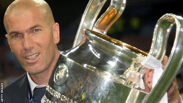 Zinedine Zidane with the Champions League trophy