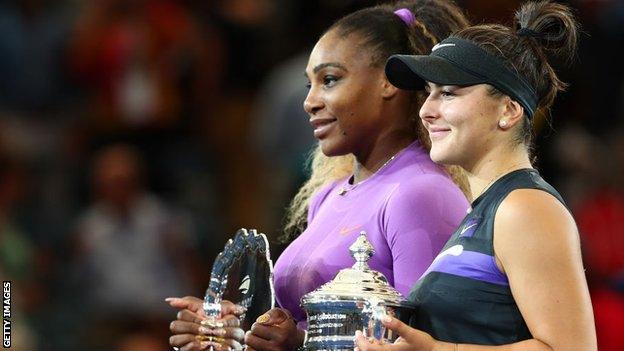 Serena Williams and Bianca Andreescu hold their US Open prizes