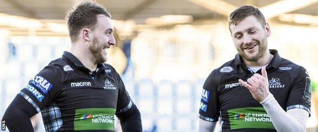 Stuart Hogg and Finn Russell celebrate a Glasgow victory