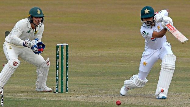 Babar Azam drives through the covers