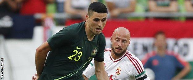 Australia's Tom Rogic (left) in action against Hungary