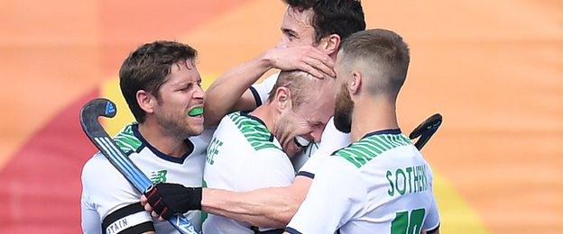 Delight for Ireland's Eugene Magee after he makes it 1-1 against Germany in the Pool B encounter