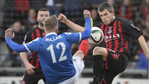 Kirk Millar and Craig McClean vie for possession during the top-of-the-table clash at Seaview