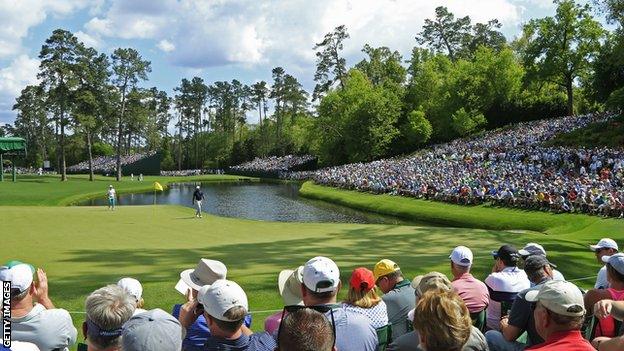 Augusta patrons watch the action on the 16th green during the 2019 Masters