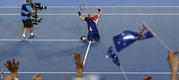 Hewitt falls to his knees after his win