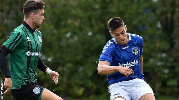 Andrea Badan (right) recently featured for Oldham in a pre-season friendly against local League One side Rochdale