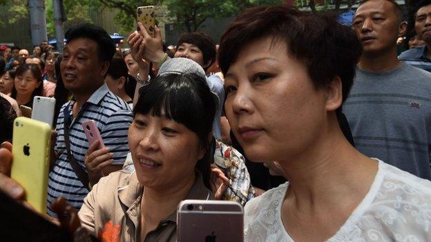 Parent wait outside exam hall