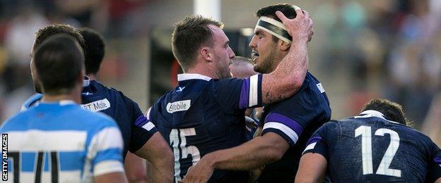 Stuart Hogg and Stuart McInally celebrate the win over Argentina