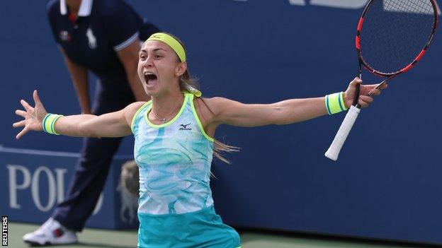 Aleksandra Krunic celebrates beating Johanna Konta at the US Open