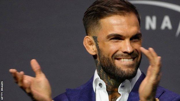 Cody Garbrandt laughs and applauds