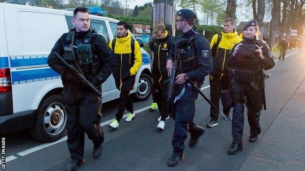 German police escort Dortmund players