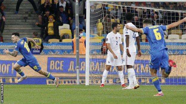 Ukraine's Mykola Shaparenko (left)celebrates after scoring against Fance