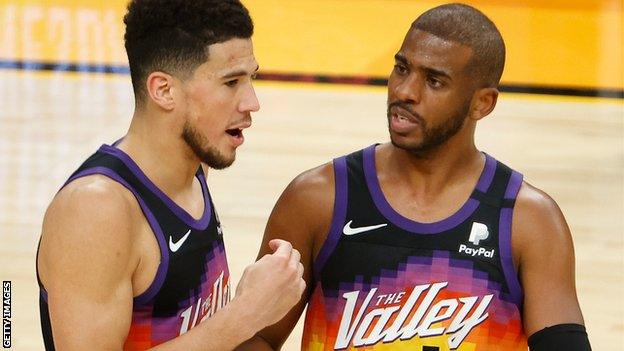 Devin Booker (left) and Chris Paul (right)