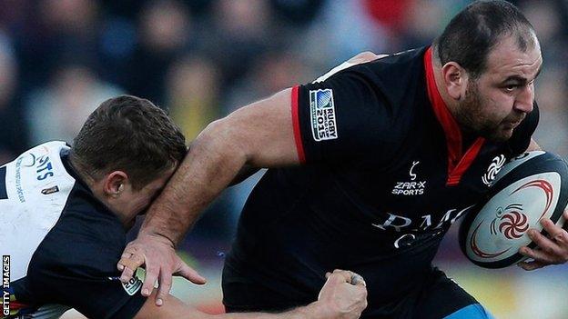 Anton Peikrishvili of Georgia is tackled by Mihai Macovei of Romania during the FIRA-AER European Nations Cup Division 1A match between Georgia and Romania at the Mikheil Meskhi Stadium on March 15, 2014 in Tbilisi, Georgia