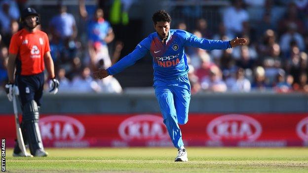 India spinner Kuldeep Yadav celebrates taking a wicket against England