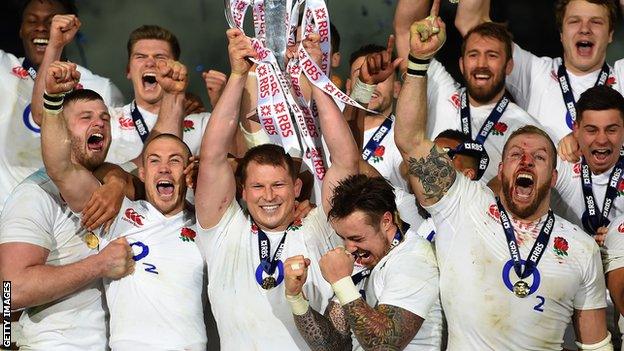 England players celebrate their 2016 Grand Slam