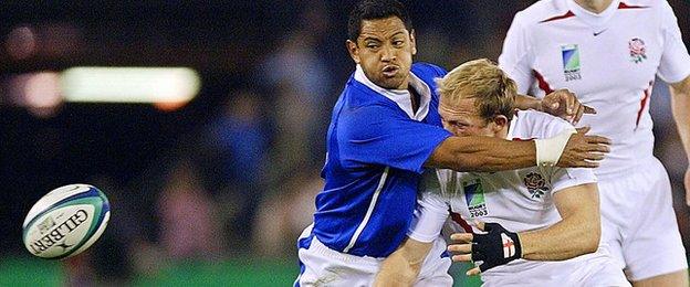 Matt Dawson is tackled by Earl Va'a