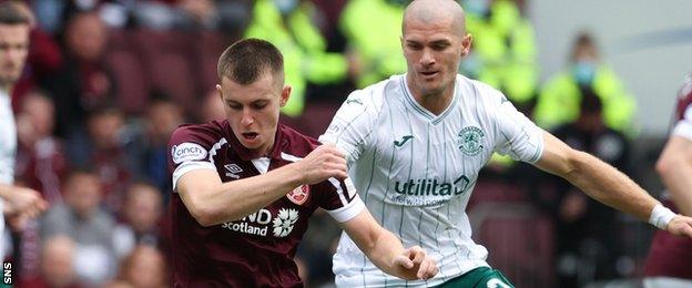 Hearts' Ben Woodburn (left)