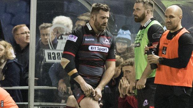 Edinburgh's Simon Berghan leaves the field against Glasgow