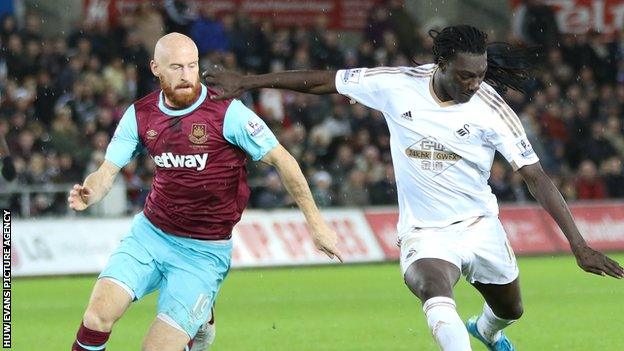 James Collins in action for West Ham against Swansea City