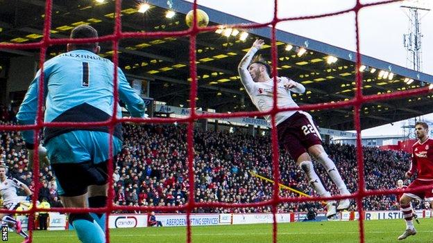 Hearts' Jordan McGhee rises to handle