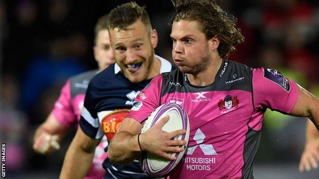 Gloucester's Henry Purdy carries the ball