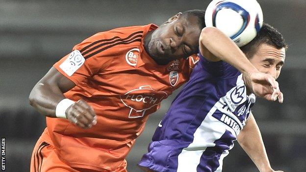 Lamine Kone wins a header for Lorient against Toulouse in a recent Ligue 1 match