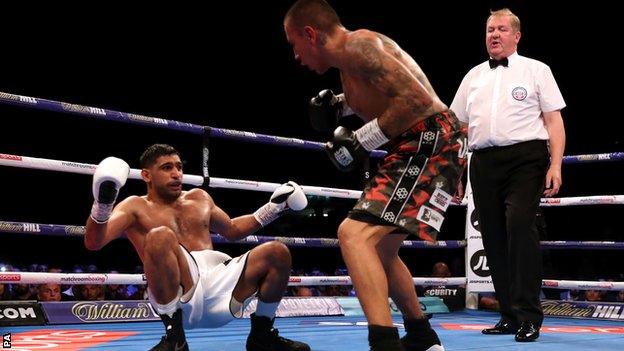 Khan quickly got back to his feet after being put down in round two