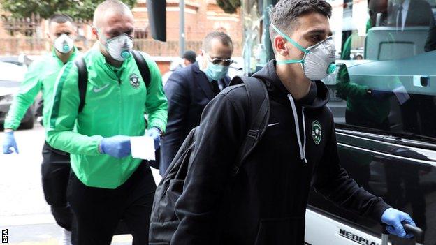 Ludogorets players arrived in Milan on Wednesday wearing masks and gloves