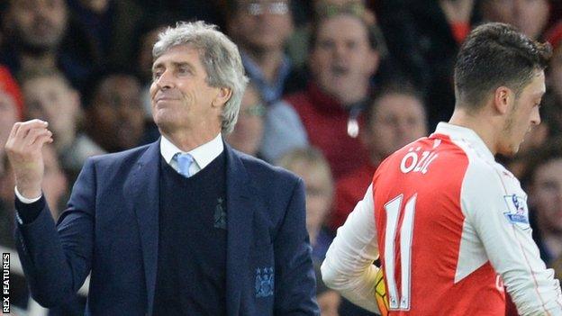 Manuel Pellegrini and Mesut Ozil