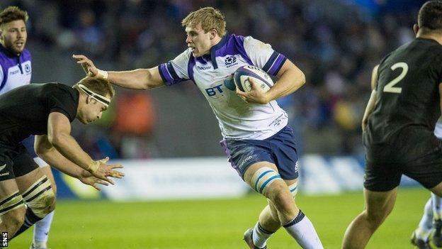 Jonny Gray carries for Scotland against New Zealand