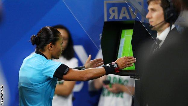 Referee uses views VAR monitor