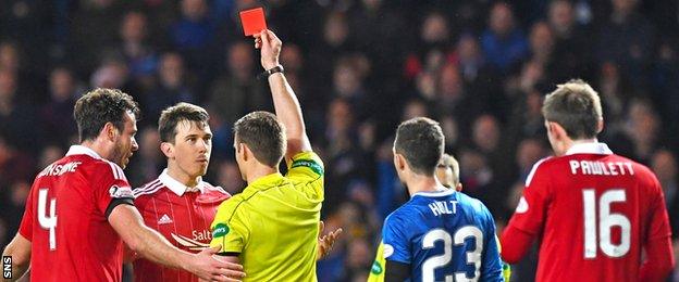 Ryan Jack is shown a red card