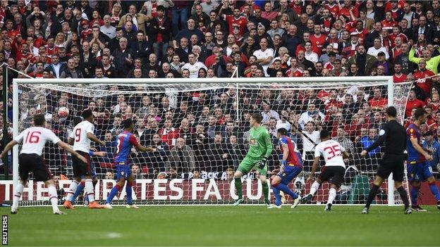 Manchester United forward Jesse Lingard scores against Crystal Palace in the FA Cup final