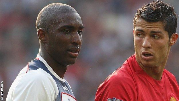 Jlloyd Samuel and Cristiano Ronaldo