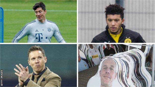 Robert Lewandowski, Jadon Sancho, Julian Nagelsmann and cardboard cut-outs of Borussia Monchengladbach fans