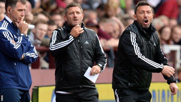 Assistant manager Tony Docherty and manager Derek McInnes shout instructions to the players