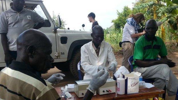 Carrying out blood tests to look for sleeping sickness